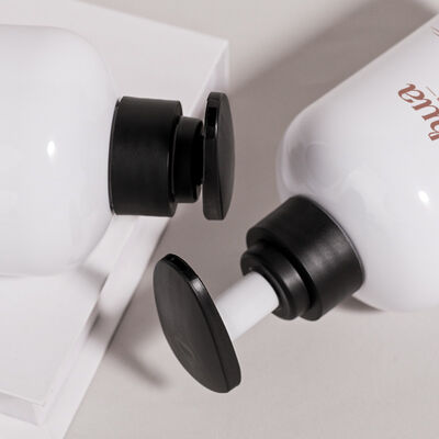 Botol kosmetik PET bulat 500 ml yang terbuat dari bahan daur ulang yang mendukung inisiatif kemasan berkelanjutan dalam kosmetik